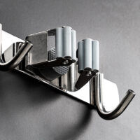 Bezem ophangsysteem voor tegen de muur