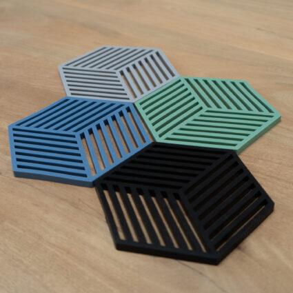 hexagon-pannenonderzetters-zwart-blauw-groen-grijs