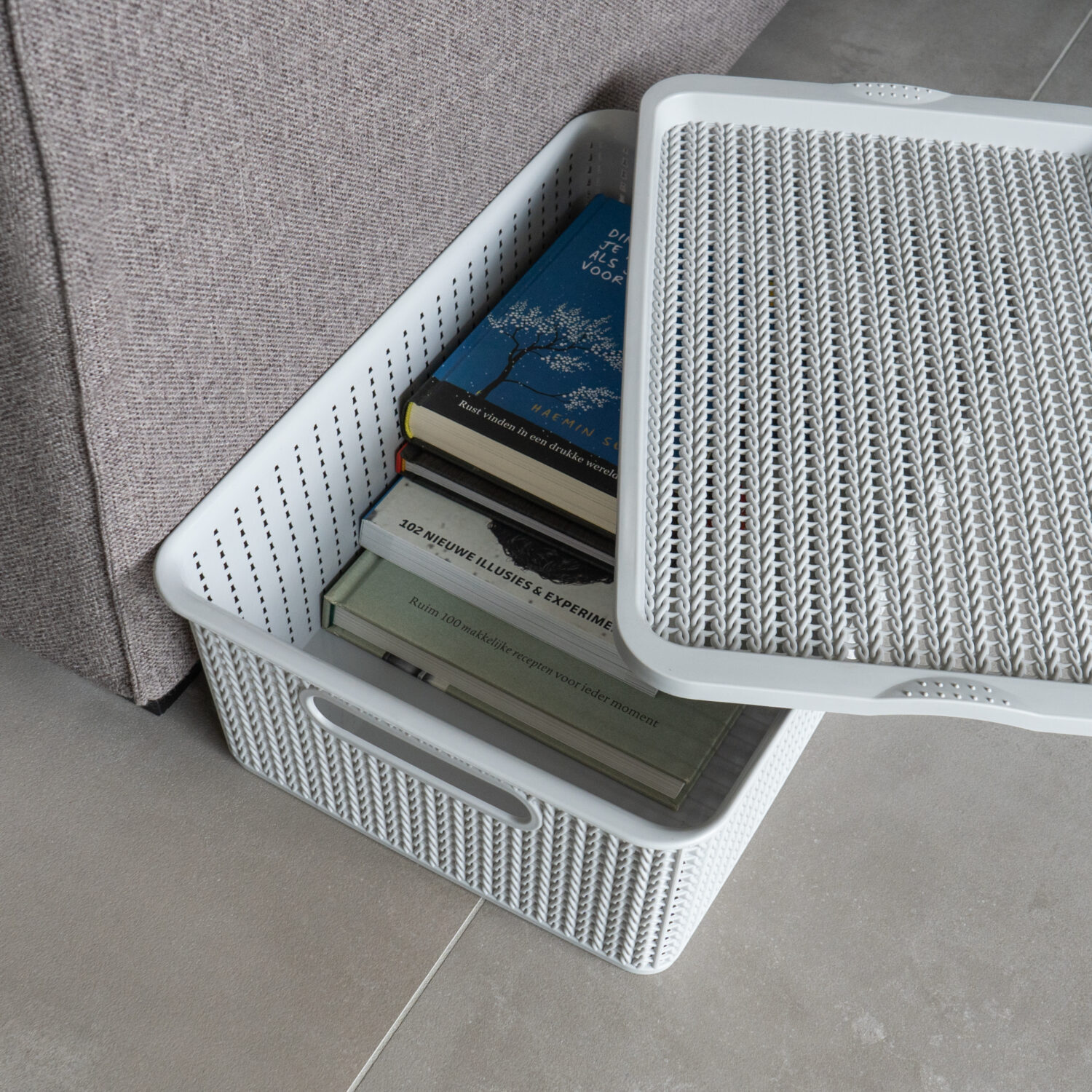 Grijze opbergmand bij homeliving