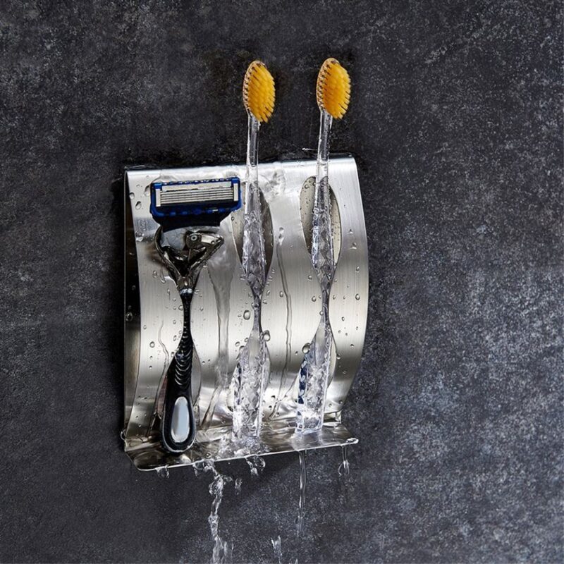 QUVIO Tandenborstelhouder met zeepdispenser – Zwart met goud