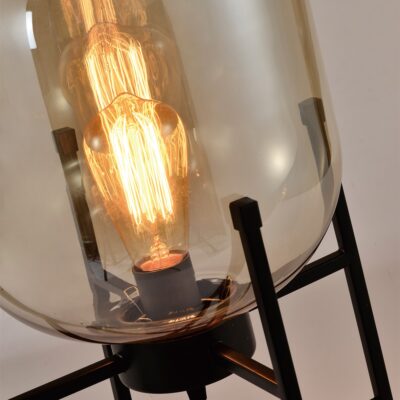 Bulb in glazen stolp met stalen frame