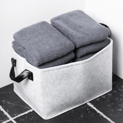 Grijs vilten opbergmand voor spullen in op te bergen