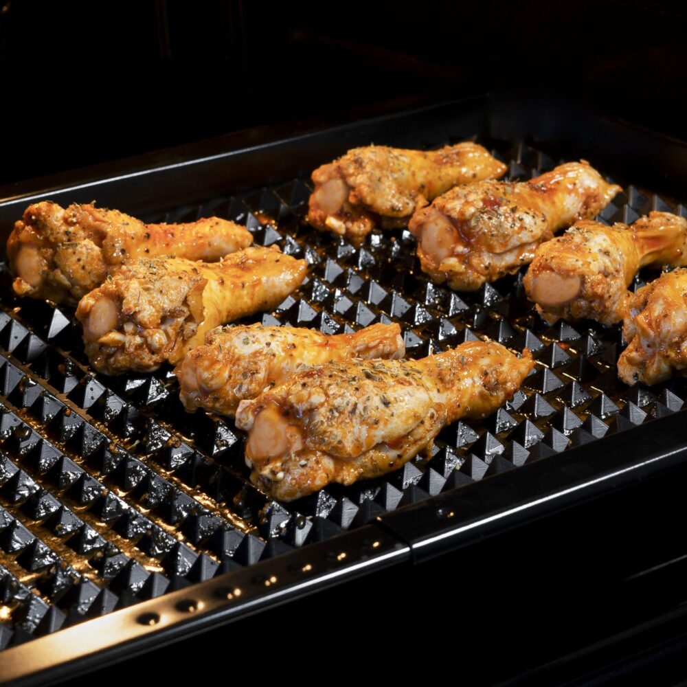 Zwarte bakmat voor grillen van kip